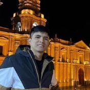 Photo of Juan Alvaro Crespo Espinoza in front of the Cathedral of Arequipa